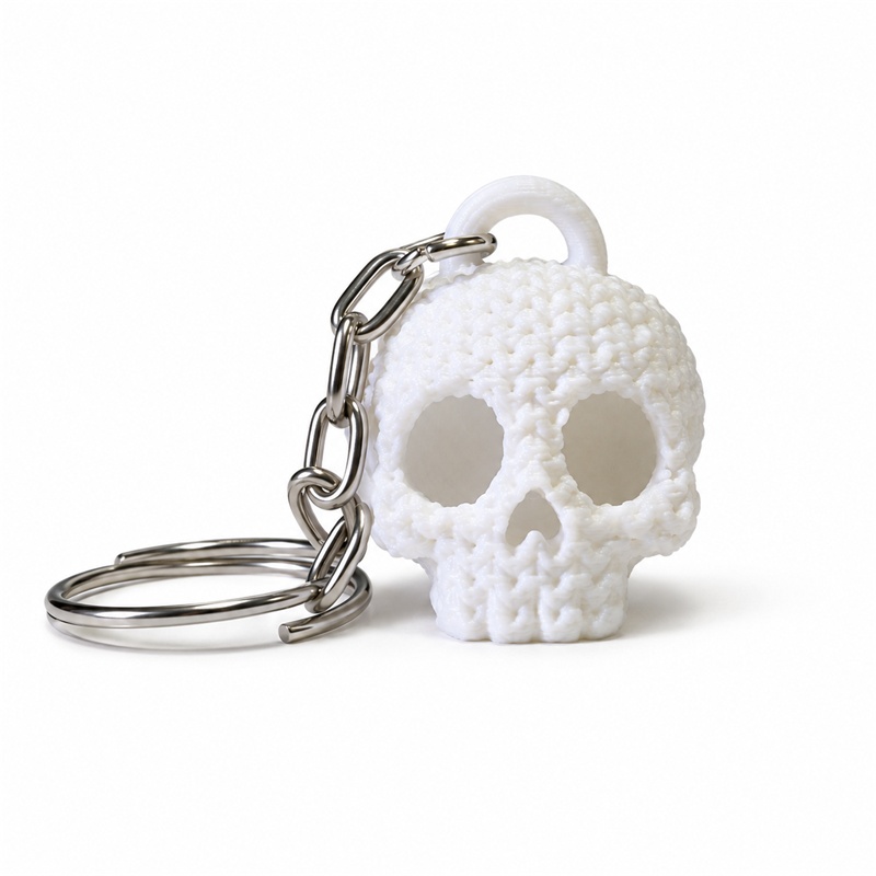Chaveiro de caveira com textura de tricô